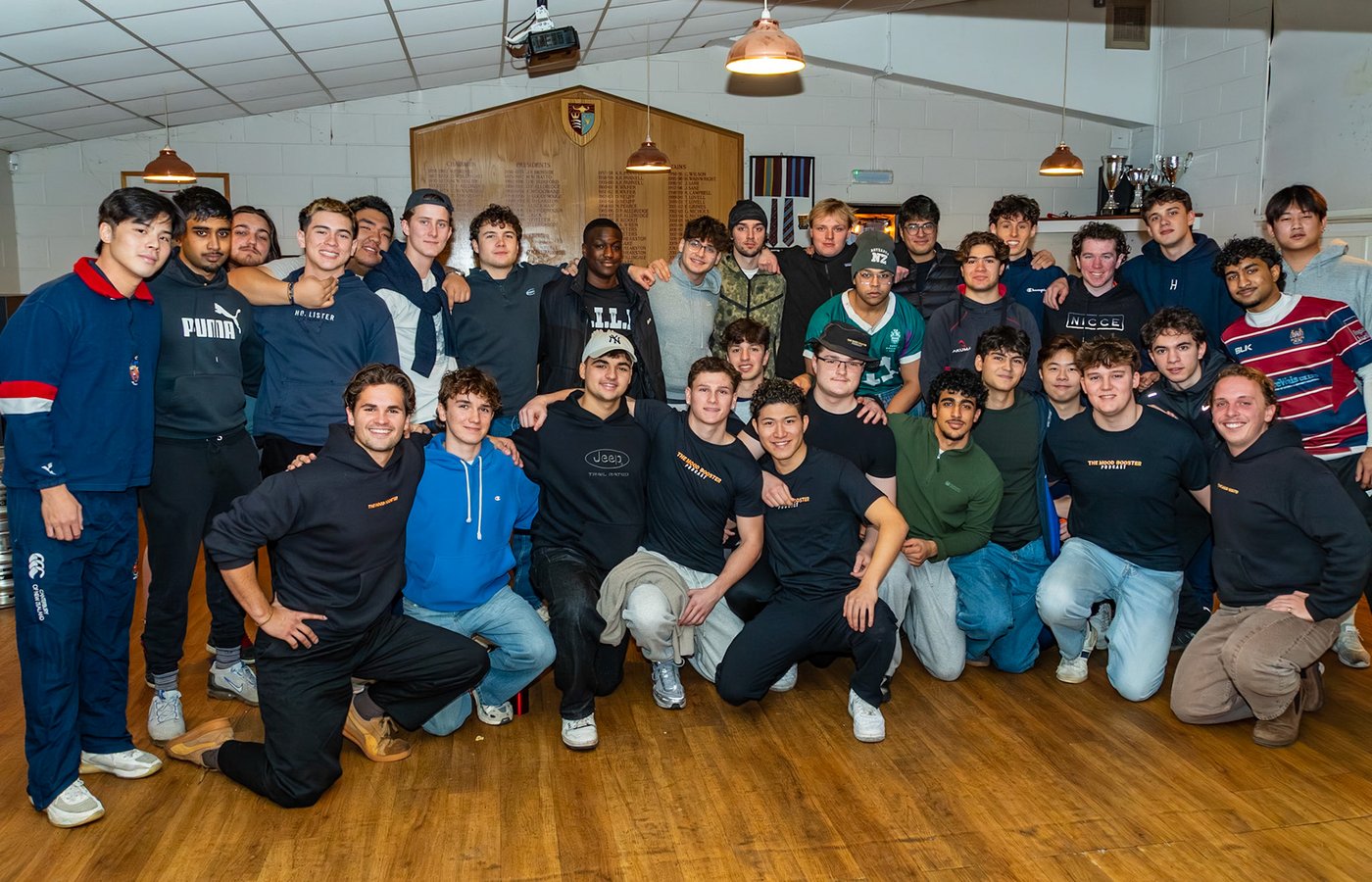 A large group photo from a Mood Booster university workshop