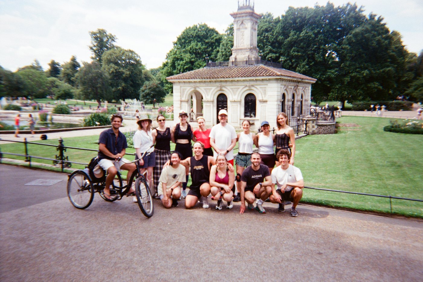 A group of runners gathered together in a park